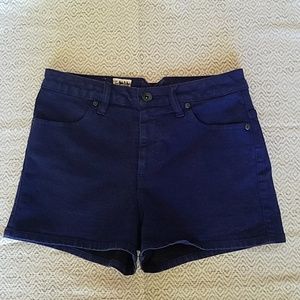 Dark blue high waisted Volcom shorts.